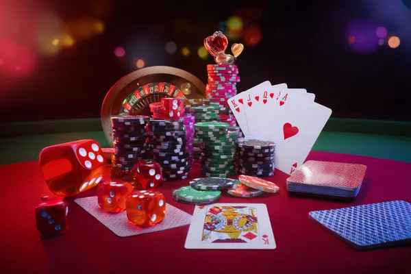 A player using their smartphone during a festive local event, representing 9777BET’s fully mobile-friendly casino.